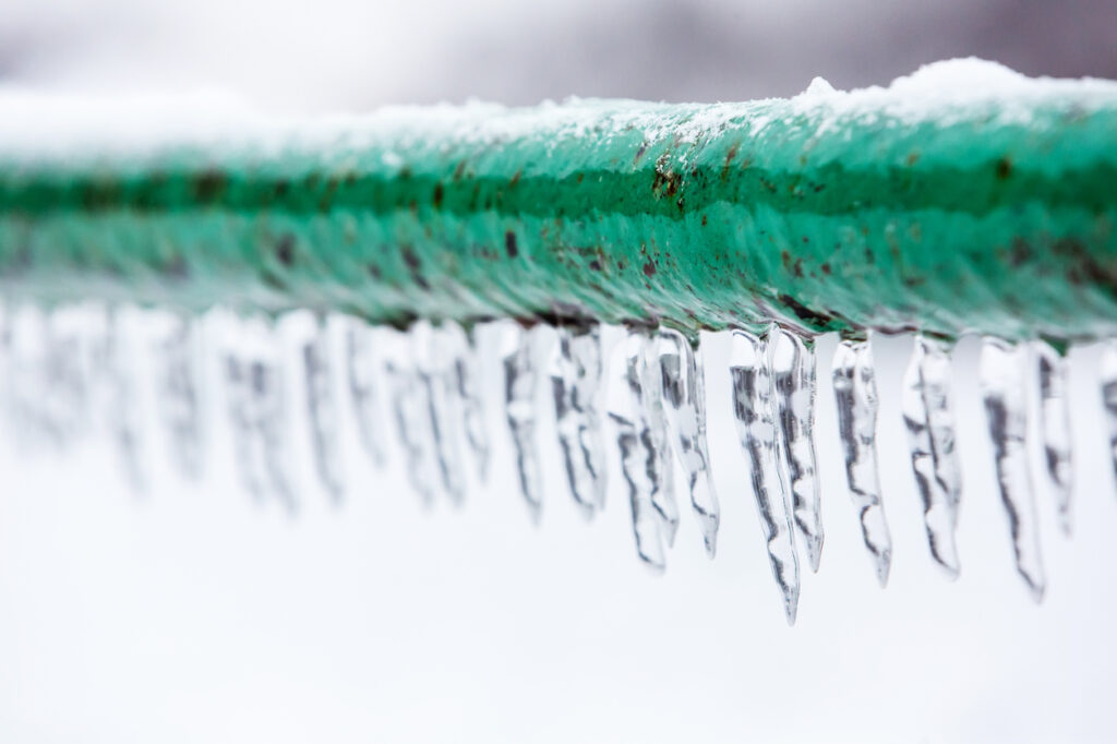Frozen icy down pipe