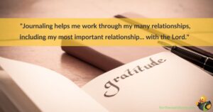 A journal with the word gratitude written at the top of the page. The words 