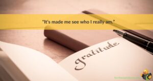 A notebook with the word gratitude in it, overlayed with a quote about reflection