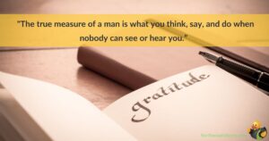 A journal with the word gratitude written at the top of the page. The words 