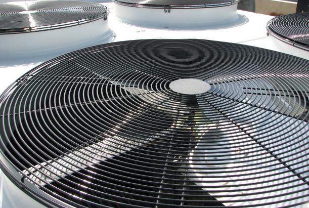 A close-up photo of an air conditioner, focused on the fan.