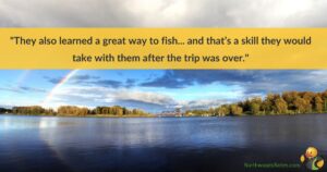 A view of a lake, some greenery, and a rainbow.  Across the top are the words 