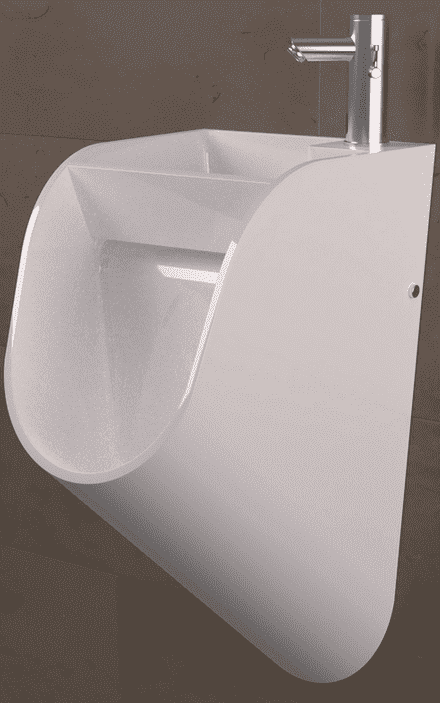 A white urinal on a tan wall